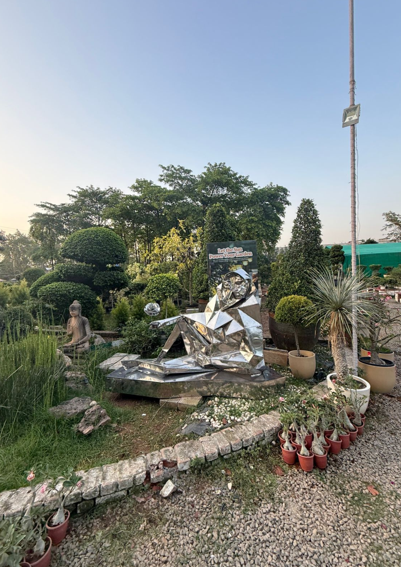 Lady with a Flower – A Contemporary Sculpture Celebrating Grace & Beauty by Artist Vikash Kalra